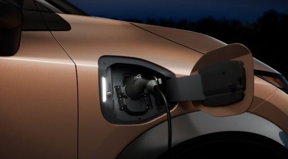 Close-up image of charging cable plugged in | Blackburn Nissan in Vicksburg MS
